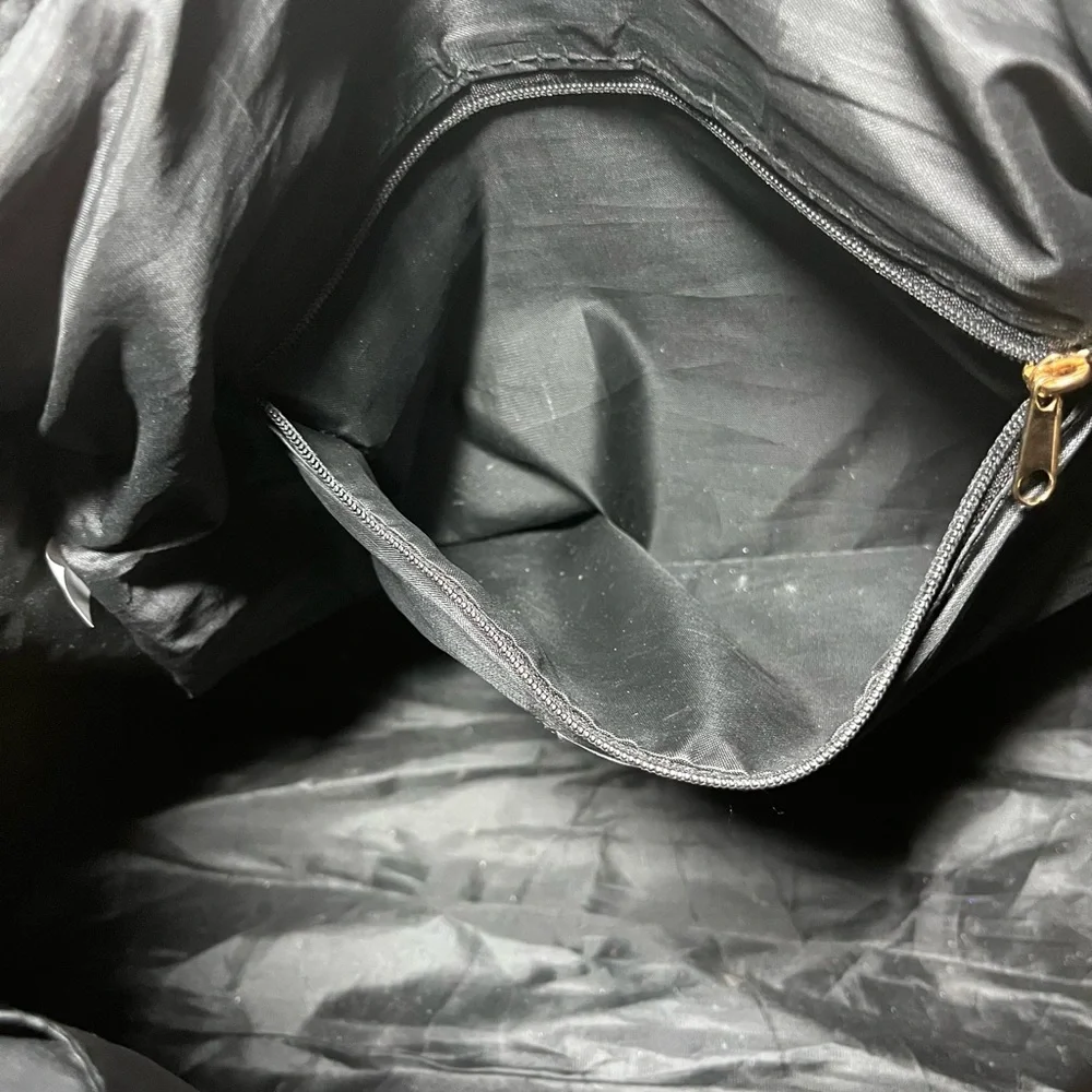 Justice Gold, metallic duffel bag
